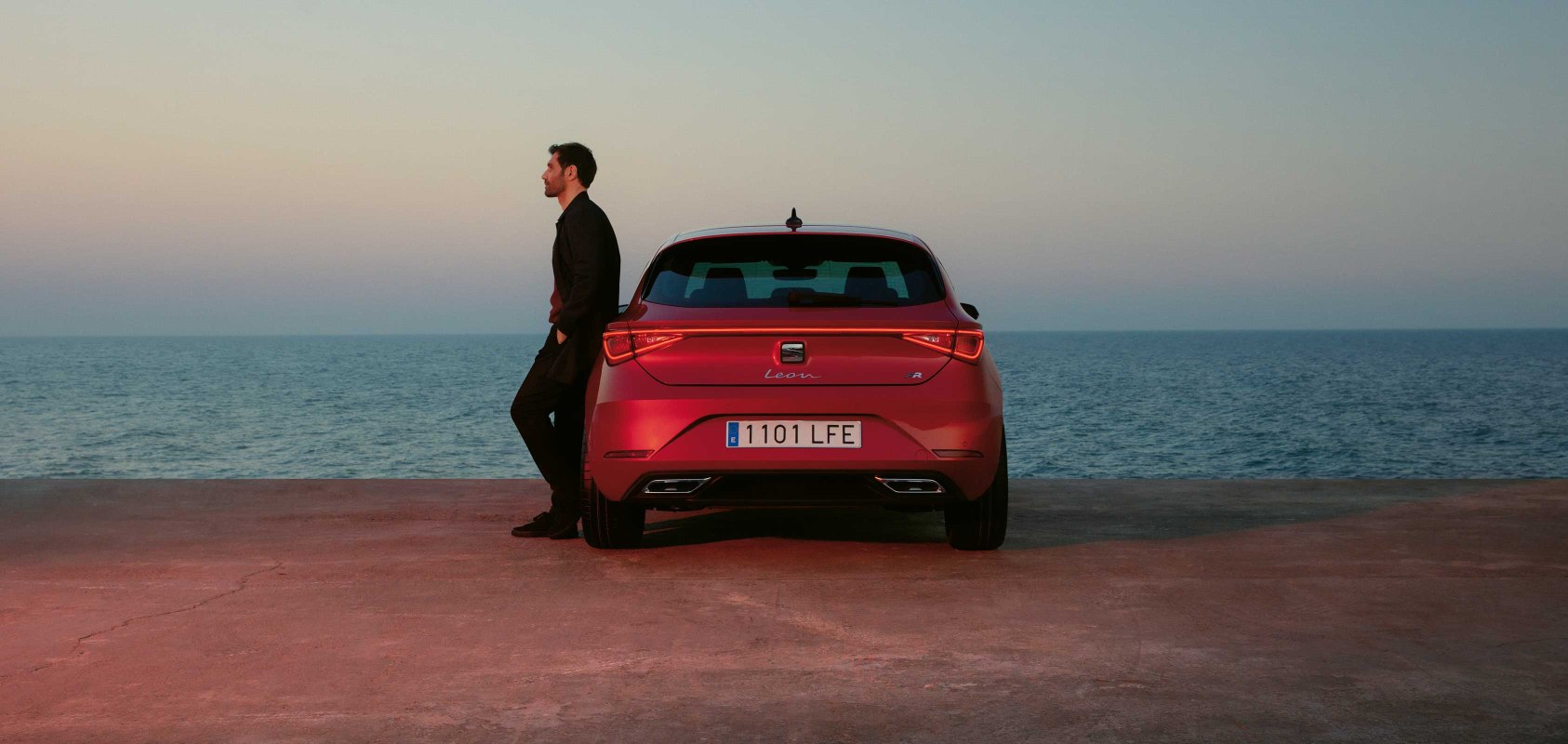 New SEAT Leon desire red colour with the rear to rear coast lights