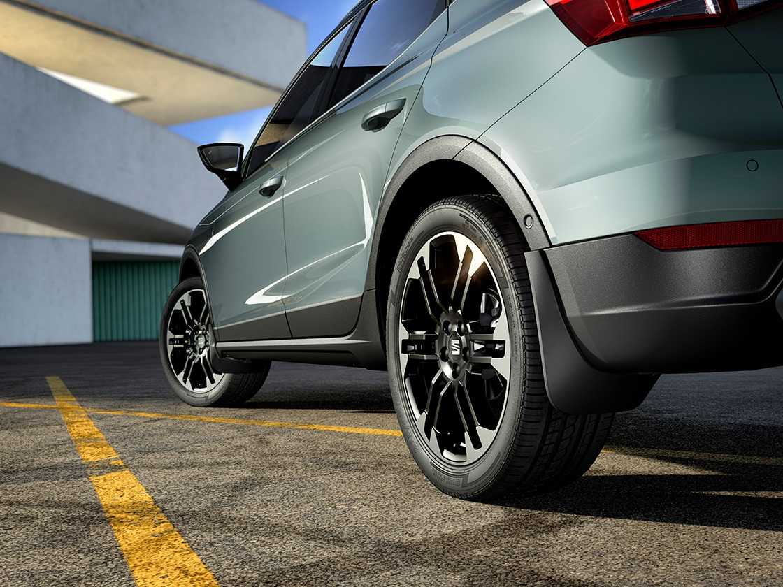 Person holding their smartphone checking seat connect system.