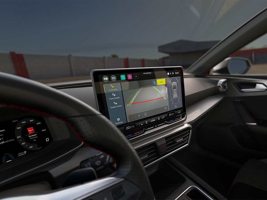 Interior view of the seat leon 2025's digital dashboard, compatible with wireless apple carplay and carplay android auto, allong with lane assist and advanced driving aids.